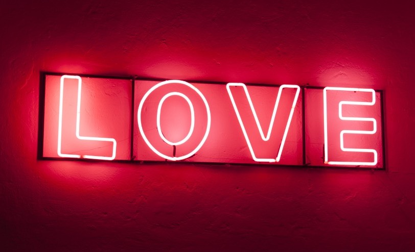love spelled out in a neon sign